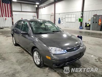 Zdjęcie 11 z 14 samochodu: 2007 FORD FOCUS ZX4 VIN:1FAHP34N57W221192 - miniatura