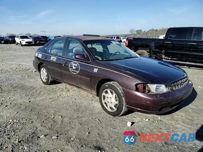 Zdjęcie 11 z 14 samochodu: 1999 NISSAN ALTIMA XE VIN:1N4DL01D8XC144467 - miniatura