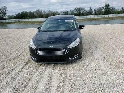Zdjęcie 11 z 14 samochodu: 2017 FORD FOCUS TITANIUM VIN:1FADP3N28HL214498 - miniatura