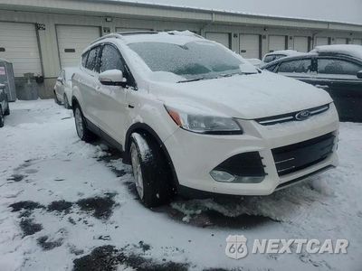 Zdjęcie 11 z 15 samochodu: 2014 FORD ESCAPE TITANIUM VIN:1FMCU0J92EUB58866 - miniatura