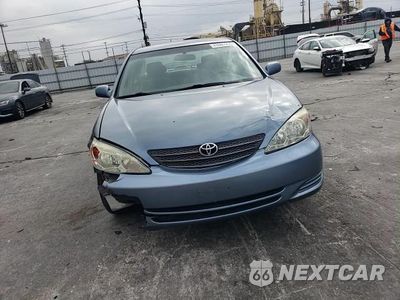 Zdjęcie 10 z 14 samochodu: 2004 TOYOTA CAMRY LE VIN:4T1BE32K44U849262 - miniatura