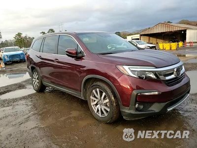 Zdjęcie 12 z 15 samochodu: 2020 HONDA PILOT EXL VIN:5FNYF5H58LB012059 - miniatura