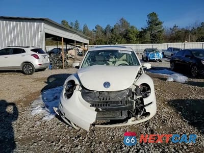 Zdjęcie 11 z 14 samochodu: 2008 VOLKSWAGEN NEW BEETLE TRIPLE WHITE VIN:3VWFW31C68M524651 - miniatura