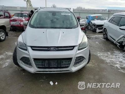 Zdjęcie 12 z 15 samochodu: 2014 FORD ESCAPE TITANIUM VIN:1FMCU9J96EUA40386 - miniatura