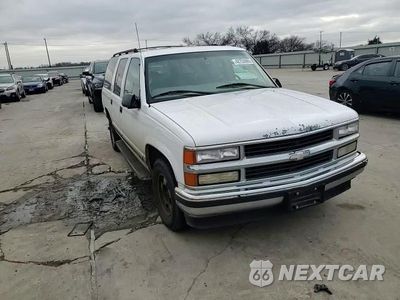 Zdjęcie 11 z 14 samochodu: 1999 CHEVROLET SUBURBAN VIN:3GNET16R9XG258538 - miniatura