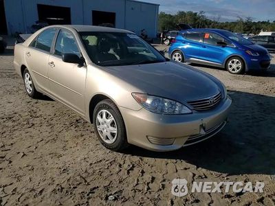 Zdjęcie 11 z 14 samochodu: 2006 TOYOTA CAMRY LE VIN:JTDBE32K163057146 - miniatura