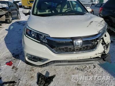 Zdjęcie 10 z 14 samochodu: 2015 HONDA CR-V TOURING VIN:5J6RM4H96FL128010 - miniatura