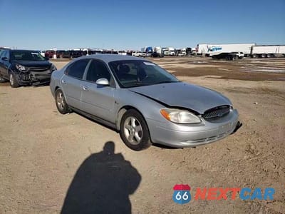 Zdjęcie 11 z 14 samochodu: 2000 FORD TAURUS SE VIN:1FAFP5327YG202472 - miniatura