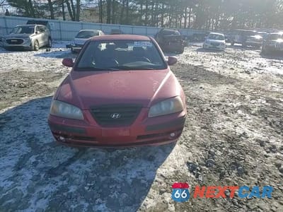 Zdjęcie 10 z 14 samochodu: 2004 HYUNDAI ELANTRA GLS VIN:KMHDN46D04U737438 - miniatura