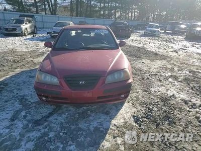 Zdjęcie 10 z 14 samochodu: 2004 HYUNDAI ELANTRA GLS VIN:KMHDN46D04U737438 - miniatura