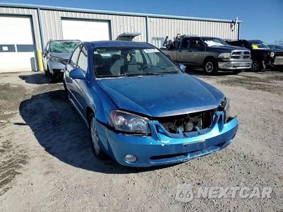 Zdjęcie 11 z 14 samochodu: 2006 KIA SPECTRA LX VIN:KNAFE121565314095 - miniatura