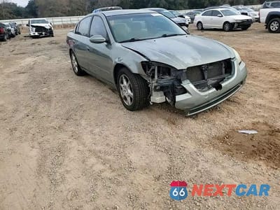 Zdjęcie 10 z 14 samochodu: 2002 NISSAN ALTIMA SE VIN:1N4BL11D42C199455 - miniatura