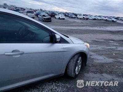 Zdjęcie 10 z 14 samochodu: 2014 FORD FOCUS SE VIN:1FADP3K27EL157355 - miniatura