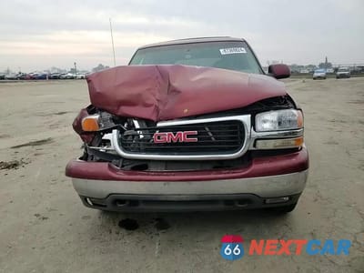 Zdjęcie 11 z 15 samochodu: 2002 GMC YUKON VIN:1GKEC13T02R245117 - miniatura