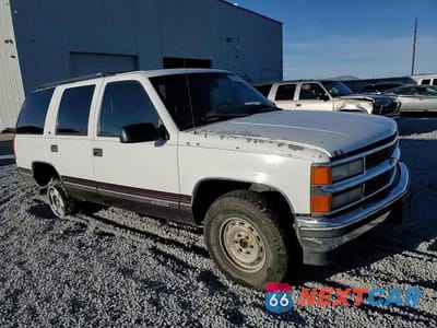 Zdjęcie 12 z 15 samochodu: 1996 CHEVROLET TAHOE K1500 VIN:1GNEK13R4TJ316913 - miniatura