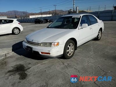 Zdjęcie 11 z 14 samochodu: 1994 HONDA ACCORD EX VIN:JHMCD565XRC064719 - miniatura