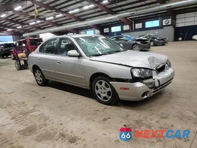 Zdjęcie 10 z 14 samochodu: 2002 HYUNDAI ELANTRA GLS VIN:KMHDN45D12U444923 - miniatura