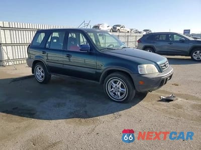 Zdjęcie 10 z 13 samochodu: 1999 HONDA CR-V LX VIN:JHLRD2844XC010900 - miniatura