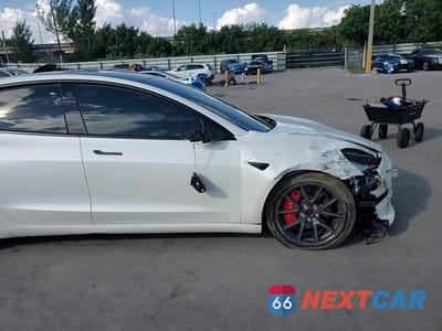 Zdjęcie 13 z 13 samochodu: 2022 TESLA MODEL 3 VIN:5YJ3E1EB7NF172839 - miniatura