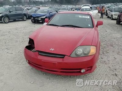 Zdjęcie 14 z 15 samochodu: 2003 HYUNDAI TIBURON GT VIN:KMHHN65F93U092142 - miniatura