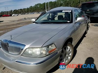 Zdjęcie 13 z 13 samochodu: 2011 LINCOLN TOWN CAR SIGNATURE LIMITED VIN:2LNBL8CV9BX750891 - miniatura