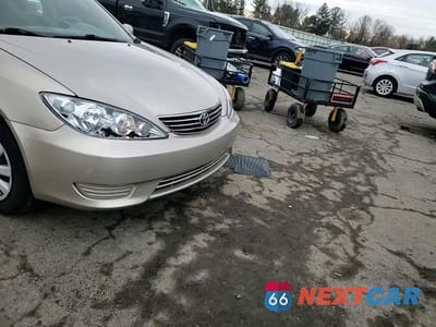 Zdjęcie 13 z 13 samochodu: 2005 TOYOTA CAMRY LE VIN:4T1BE30K95U515300 - miniatura