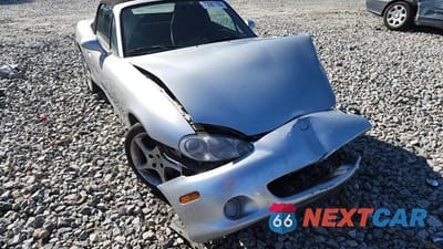 Zdjęcie 13 z 13 samochodu: 2001 MAZDA MX-5 MIATA BASE VIN:JM1NB353010207509 - miniatura