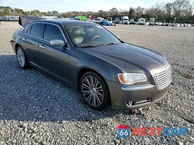 Zdjęcie 14 z 14 samochodu: 2013 CHRYSLER 300C VIN:2C3CCAEG3DH630424 - miniatura