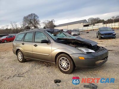 Zdjęcie 14 z 15 samochodu: 2002 FORD FOCUS SE VIN:1FAFP36342W286871 - miniatura