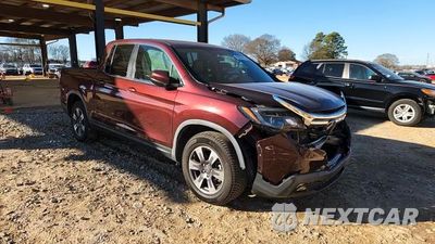 Zdjęcie 13 z 13 samochodu: 2017 HONDA RIDGELINE RTL VIN:5FPYK2F50HB003657 - miniatura