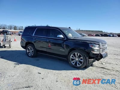 Zdjęcie 14 z 14 samochodu: 2016 CHEVROLET TAHOE K1500 LTZ VIN:1GNSKCKC5GR210005 - miniatura