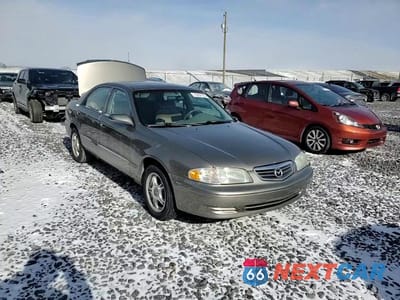 Zdjęcie 13 z 13 samochodu: 2001 MAZDA 626 ES VIN:1YVGF22CX15239215 - miniatura