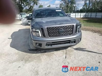 Zdjęcie 13 z 13 samochodu: 2019 NISSAN TITAN PLATINUM RESERVE VIN:1N6AA1E68KN533253 - miniatura