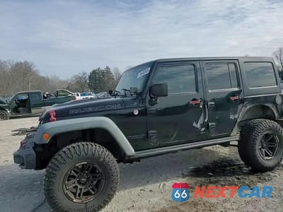 Zdjęcie 14 z 14 samochodu: 2014 JEEP WRANGLER UNLIMITED RUBICON VIN:1C4HJWFG0EL160778 - miniatura