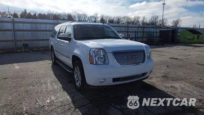 Zdjęcie 14 z 15 samochodu: 2011 GMC YUKON XL DENALI VIN:1GKS2MEF4BR139834 - miniatura