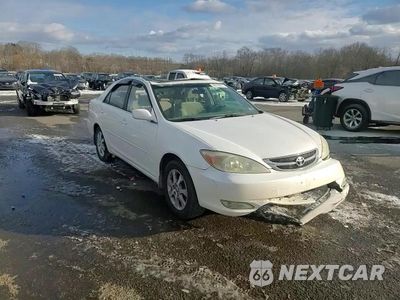 Zdjęcie 13 z 13 samochodu: 2004 TOYOTA CAMRY LE VIN:JTDBE32K040272029 - miniatura