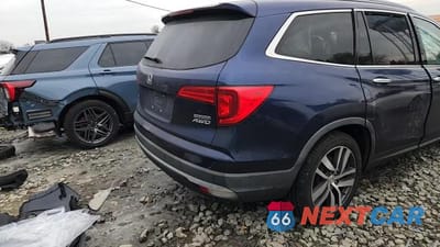 Zdjęcie 14 z 14 samochodu: 2017 HONDA PILOT TOURING VIN:5FNYF6H93HB100663 - miniatura