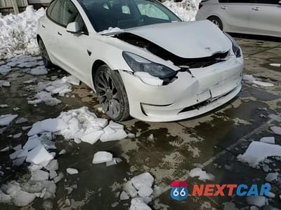 Zdjęcie 14 z 14 samochodu: 2022 TESLA MODEL 3 VIN:5YJ3E1EC1NF163806 - miniatura