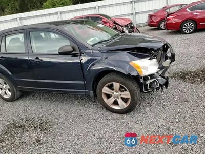 Zdjęcie 15 z 16 samochodu: 2011 DODGE CALIBER MAINSTREET VIN:1B3CB3HA6BD220939 - miniatura