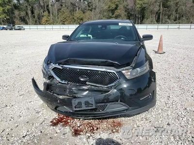 Zdjęcie 13 z 13 samochodu: 2014 FORD TAURUS SHO VIN:1FAHP2KT0EG140653 - miniatura