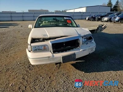 Zdjęcie 13 z 13 samochodu: 1996 LINCOLN TOWN CAR CARTIER VIN:1LNLM83W8TY616580 - miniatura