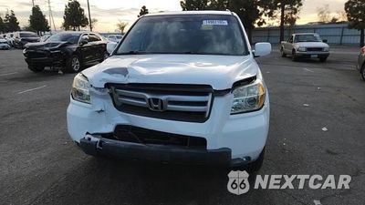 Zdjęcie 14 z 14 samochodu: 2007 HONDA PILOT EXL VIN:5FNYF28507B030608 - miniatura