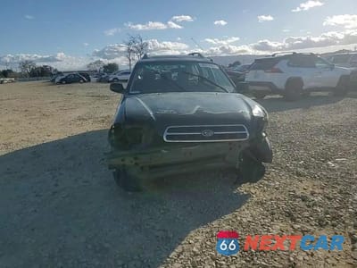 Zdjęcie 14 z 15 samochodu: 2001 SUBARU LEGACY L VIN:4S3BH635617303806 - miniatura