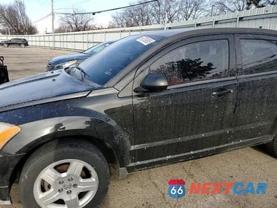 Zdjęcie 14 z 15 samochodu: 2009 DODGE CALIBER SXT VIN:1B3HB48A49D189888 - miniatura