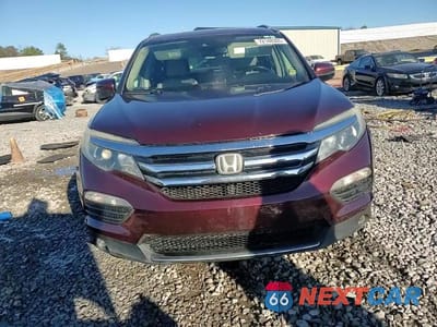 Zdjęcie 14 z 14 samochodu: 2016 HONDA PILOT TOURING VIN:5FNYF5H98GB016380 - miniatura