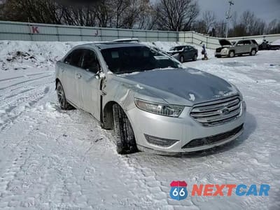 Zdjęcie 14 z 14 samochodu: 2015 FORD TAURUS SEL VIN:1FAHP2H87FG169104 - miniatura