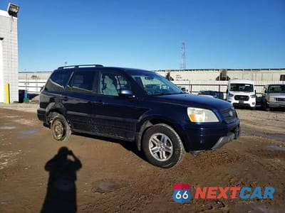 Zdjęcie 15 z 15 samochodu: 2004 HONDA PILOT LX VIN:2HKYF18494H537151 - miniatura