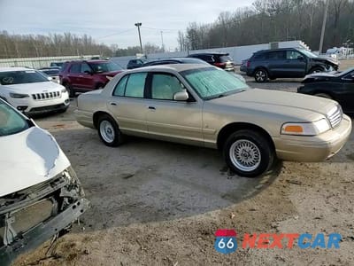 Zdjęcie 11 z 14 samochodu: 1999 FORD CROWN VICTORIA LX VIN:2FAFP74W3XX236852 - miniatura