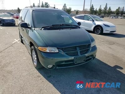 Zdjęcie 11 z 14 samochodu: 2000 DODGE GRAND CARAVAN SE VIN:1B4GP44R2YB714834 - miniatura