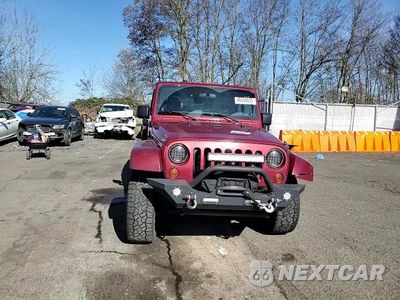 Zdjęcie 11 z 14 samochodu: 2011 JEEP WRANGLER UNLIMITED SAHARA VIN:1J4BA5H19BL549708 - miniatura